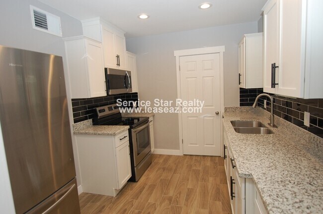 Building Photo - 4144 N 3rd Ave
