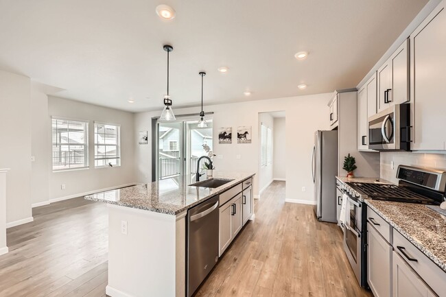 Building Photo - Evolve Real Estate: Available Immediately! Almost NEW Large 3 Bedroom in STERLING RANCH!