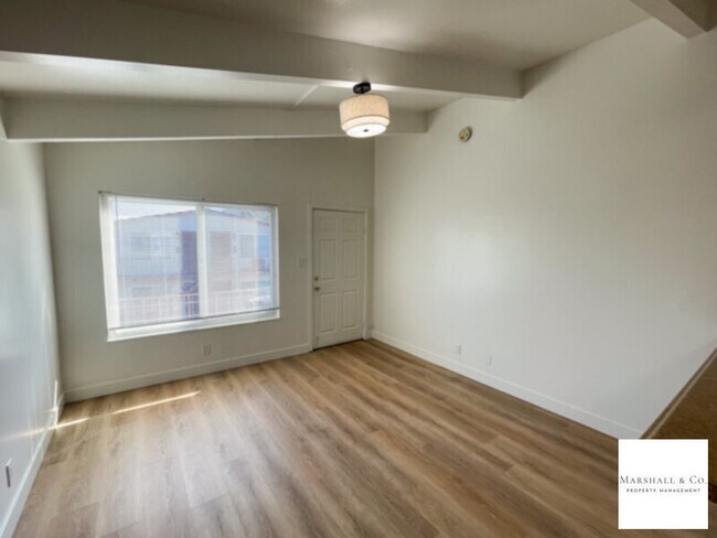 Building Photo - GOOD SIZED STUDIO - NEW LAMINATE HARDWOOD FLRS, NEW KITCHEN + BATH FEATURES!