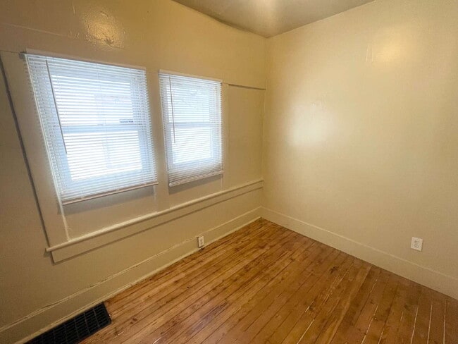 Building Photo - 3 Bedroom with 1.5 car garage/workshop combo (has electricity)