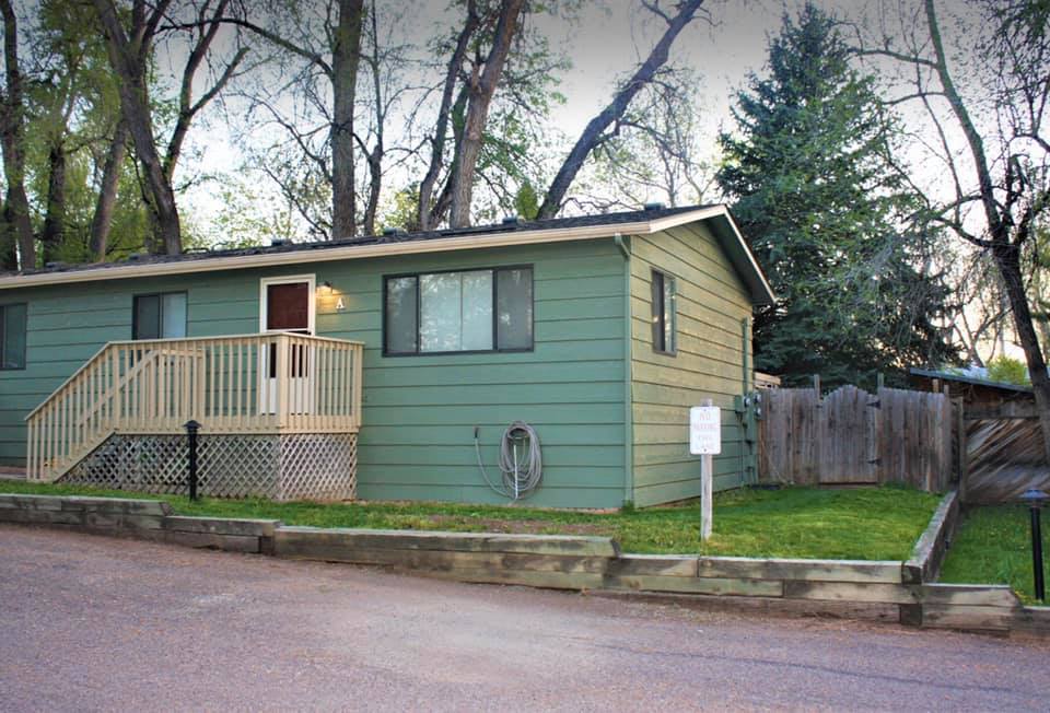 Front of duplex with side yard view - 1228 Maple Street