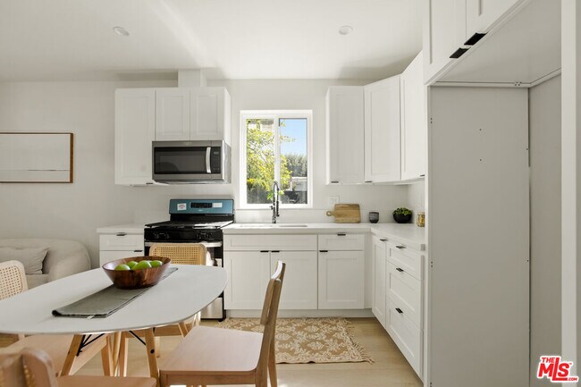 Building Photo - 7358 Paso Robles Ave