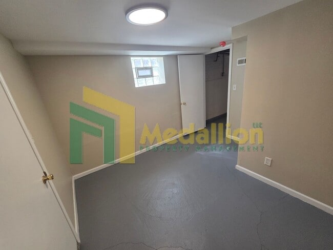 Building Photo - Spacious 4-Bedroom Home with Finished Basement and Yard Space