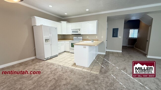 Building Photo - Beautiful townhouse in The Cottages at 9th!
