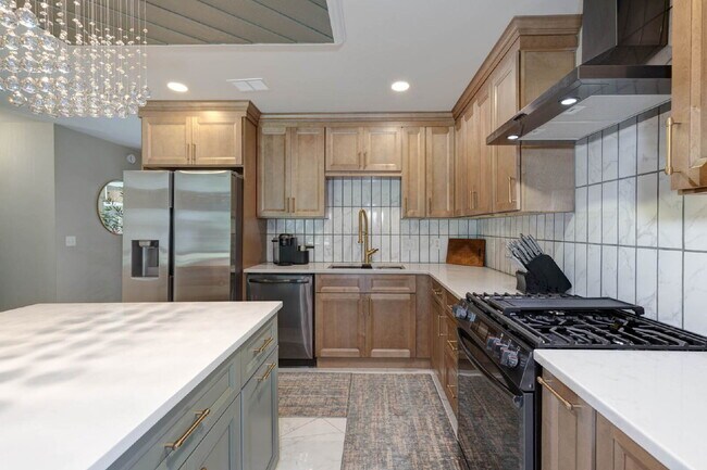 Building Photo - COMING SOON · Designer Renovation · Covered Deck Pavilion · 2-Car Garage · Lawn Care Included