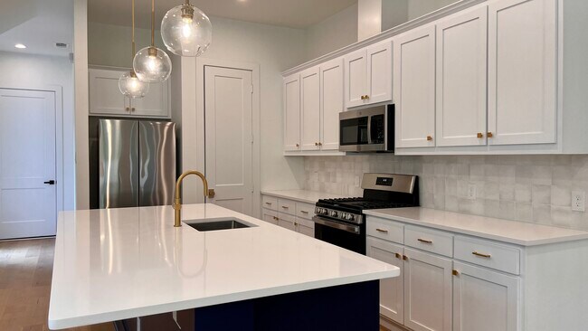 STAINLESS STEEL APPLIANCES - 5316 East Side Ave