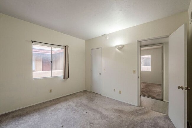 Building Photo - Bright 3-Bedroom Condo with Community Perks in Central Tucson