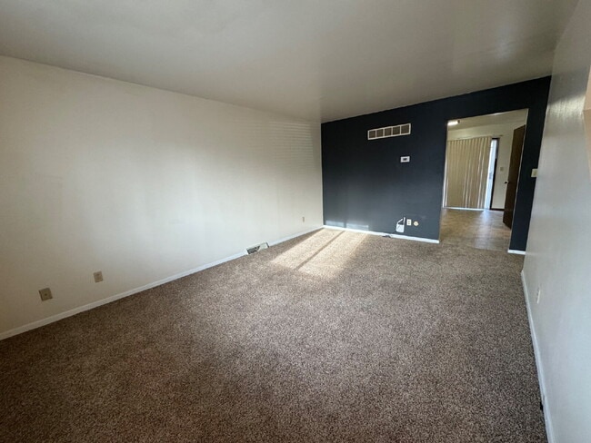 Building Photo - STOP SCROLLING — THIS TOWNHOUSE HAS IT ALL!