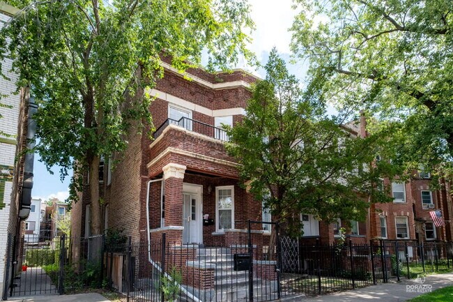 Building Photo - Modern 4BR Apartment with Hardwood Floors, Balcony & Central A/C