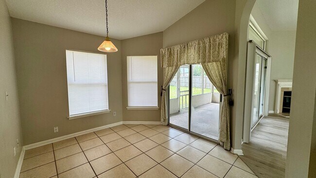 Building Photo - Bright & Spacious Home with 2 Car Attached...