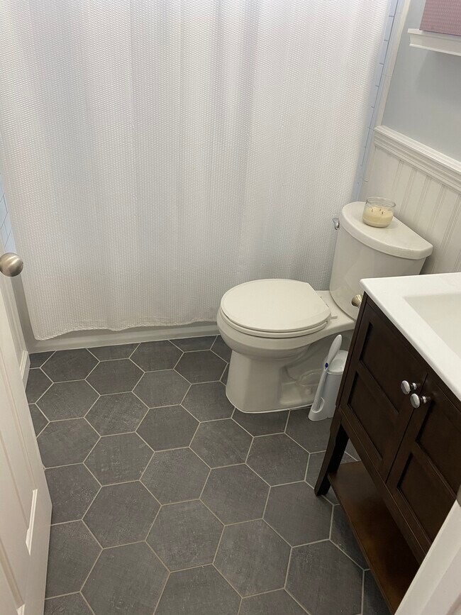 Hexagon porcelain floor and furniture piece vanity - 709 Warmstone Ct