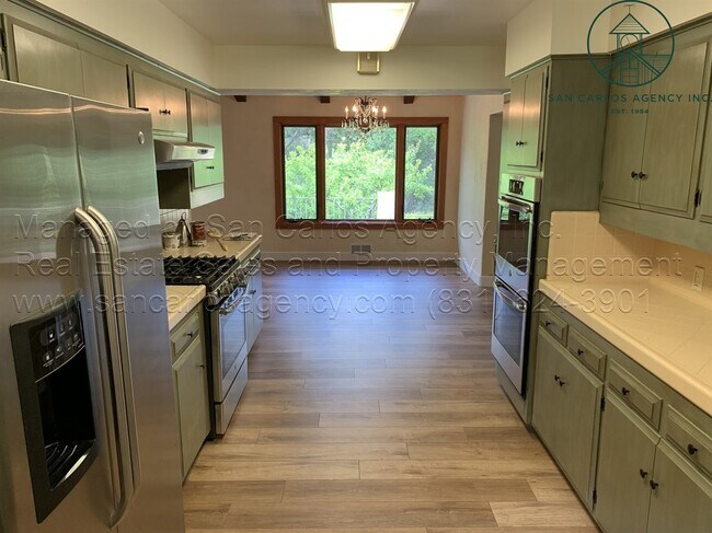 Building Photo - Updated, Sunny and Spacious 3/3 Carmel Val...