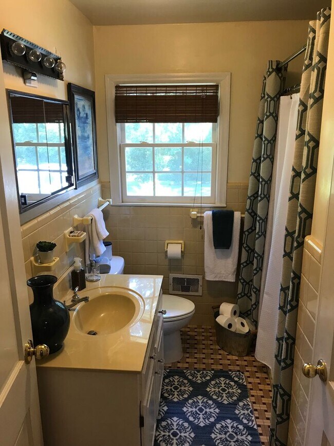 Building Photo - Charming 3BR Home Near Normaltown with Covered Porch & Hardwood Floors