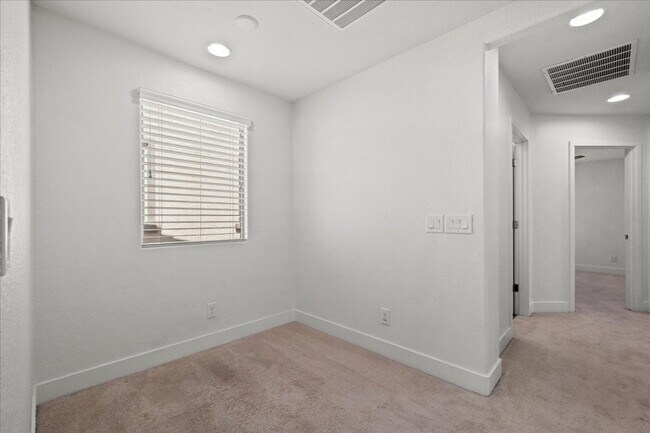 Building Photo - Modern Gated 3 Bedroom Retreat with Loft & Entertainer’s Backyard