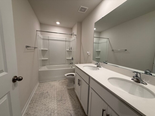 Building Photo - Spacious 5-Bedroom Home for Rent in The Falls – Modern, Comfortable, and Move-In Ready