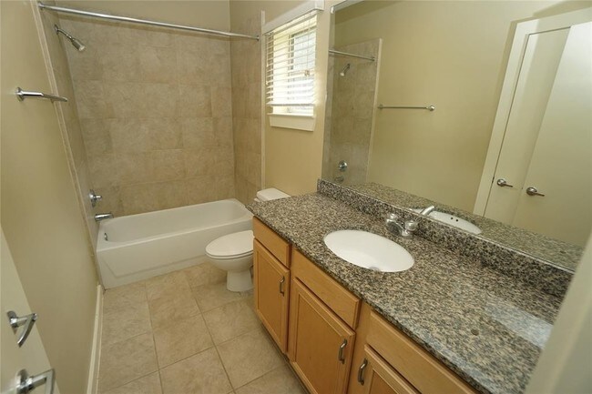 Building Photo - Elegant Gated Townhome Offering Unparallel...