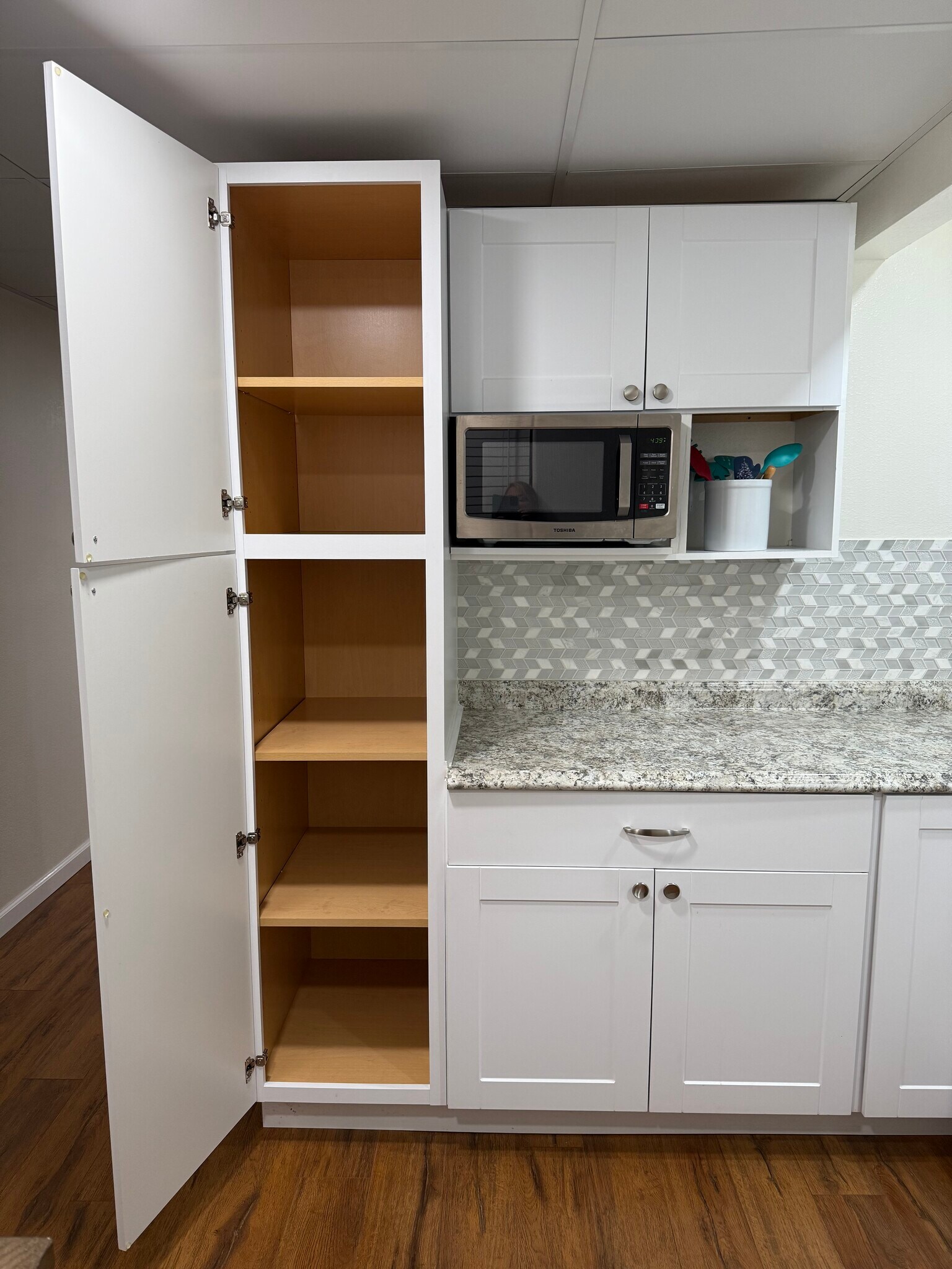 Pantry and microwave - 214 Eagle Ave