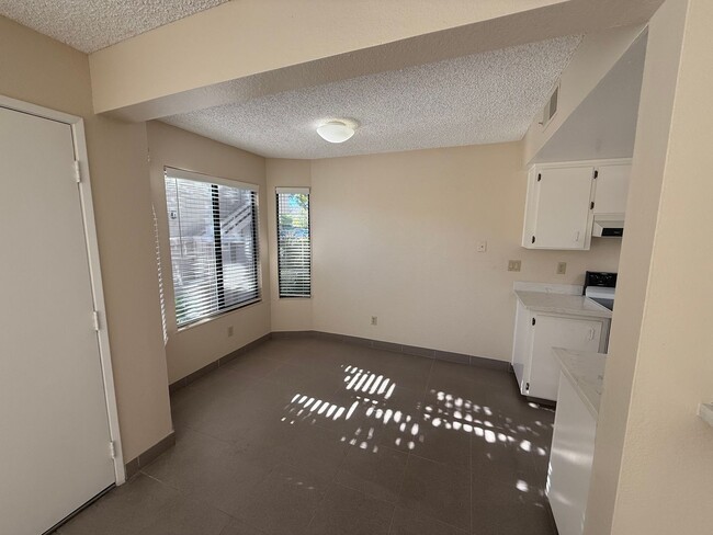 Building Photo - TWO BEDROOM / ONE BATH TWO-STORY CONDO IN ...