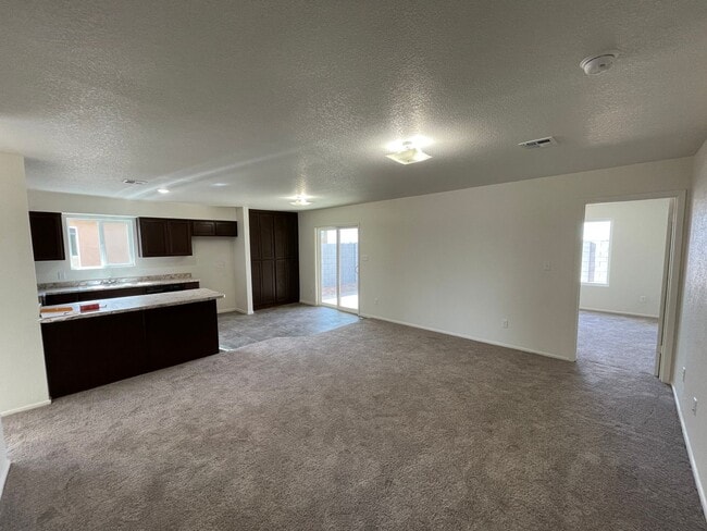 Building Photo - NEARLY NEW Home in the Desired Desert Sands Subdivision!