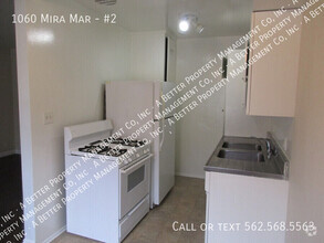 Building Photo - 1 bedroom with PLANK FLOORS & Onsite laund...