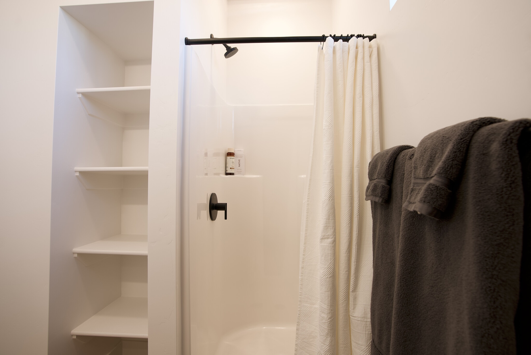 Hallway bathroom with shower stall - 525 N 1st St