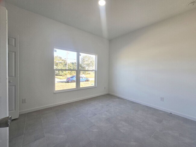 Building Photo - Brand New 2/2/1-PRIME SW LOCATION - Lehigh Acres