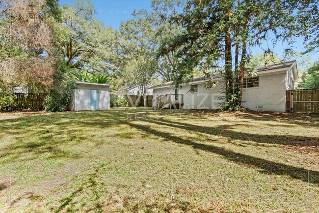 Building Photo - Stylish 3 Bed Brick Home | Modern Kitchen + Large Private Backyard