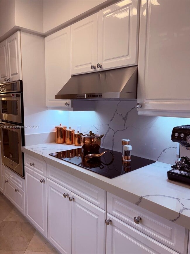 Building Photo - 4779 Collins Ave