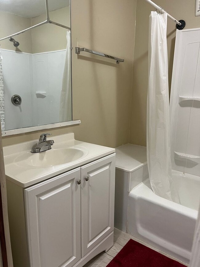 Building Photo - Clean 2 Bedroom home with hardwood flooring & large backyard