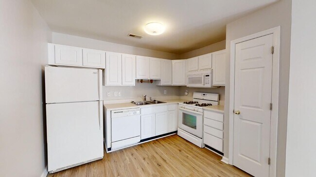 Building Photo - Townhome | Hard Surface Floors Through-Out...
