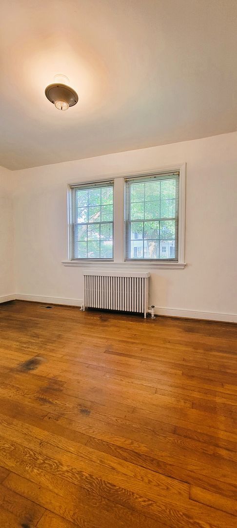 Building Photo - Remodeled brick bungalow with 1st floor li...