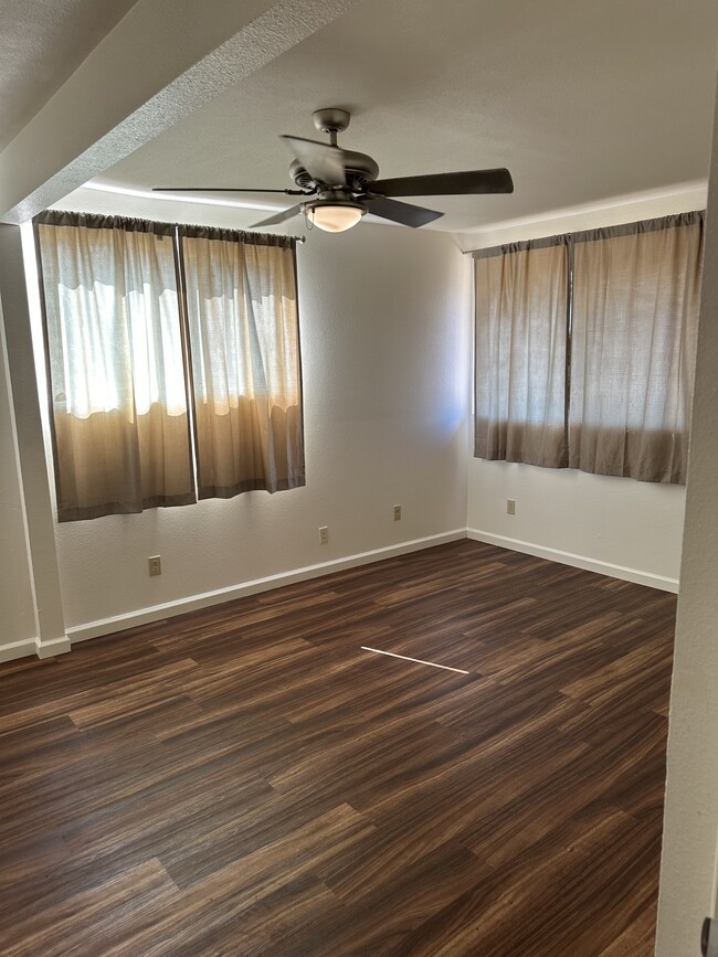 Master bedroom with a half bathroom - 1876 Palamoi St