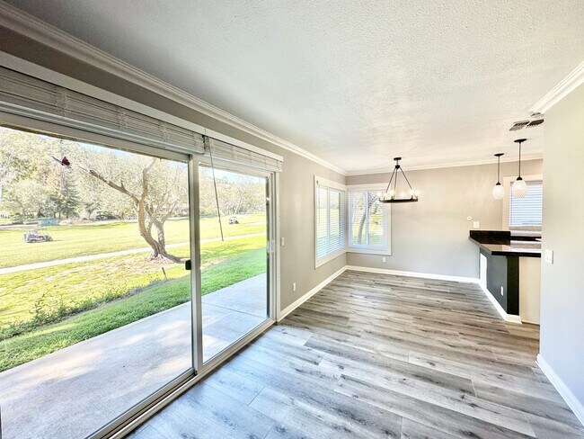 Building Photo - Beautiful, End-Unit, Ground Level, Largest SF 1/1 layout in the Pala Mesa Villas Community with G...