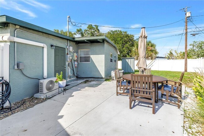 Building Photo - 7599 Meadowlawn Dr N