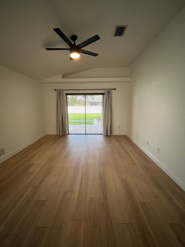 Building Photo - Convenient 3/2/2 PSL Home with Backyard Oa...