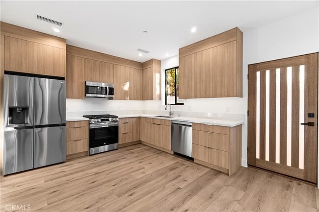 Building Photo - 7663 Maestro Ave