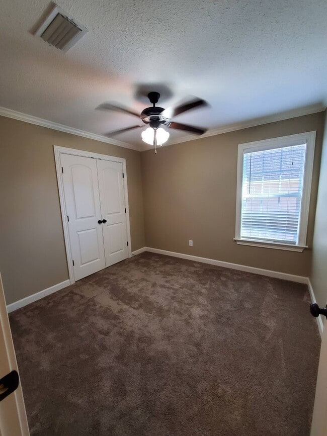 Building Photo - Spacious 4-Bedroom Home with Open Layout, Granite Finishes & Fenced Yard