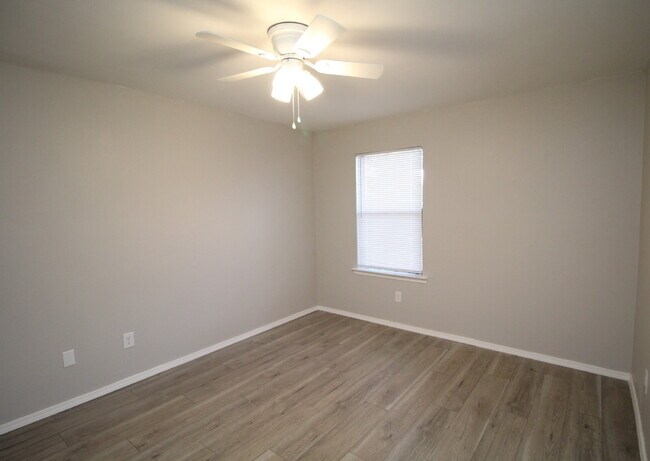 Building Photo - Ready Now Updated Two Bedroom Apartment with Wood Look Flooring and New Appliances & ½ OFF FIRST ...