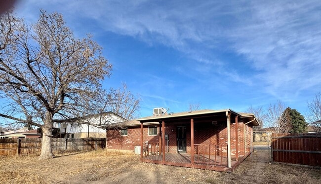 Building Photo - Spacious 5-Bedroom Single-Family Home with Fenced Yard & Garage