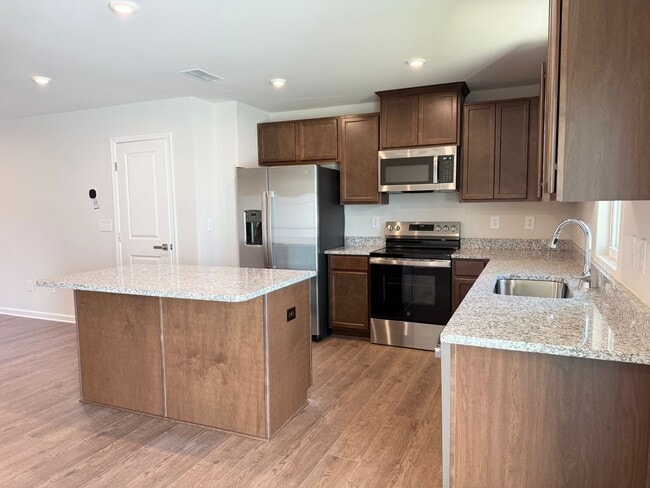 Building Photo - Modern 3-Bedroom Townhouse with Garage & P...