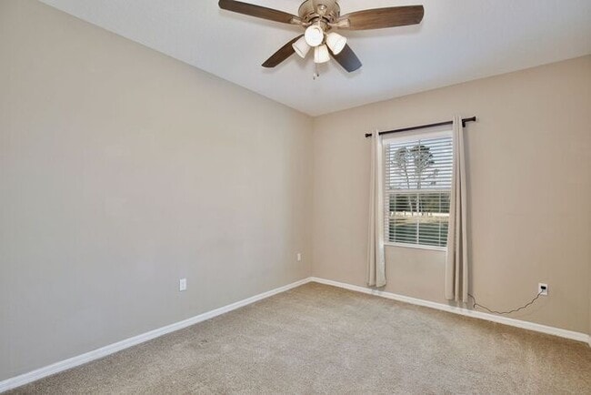 Building Photo - Gorgeous 4/2.5 Spacious Townhome with a Loft Area and a 2 Car Garage in the Desirable Gated Commu...