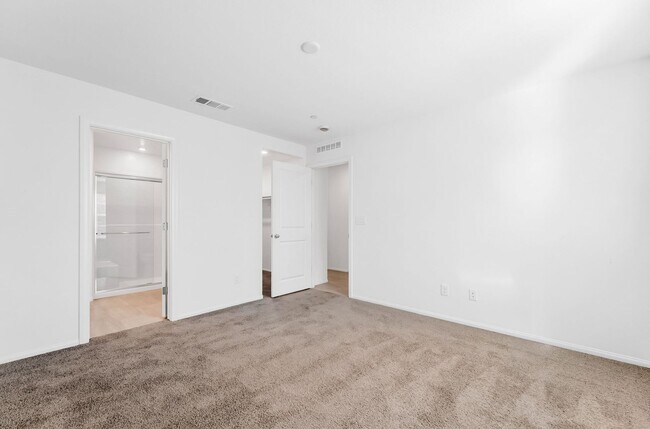 Building Photo - Modern Cadence Townhome with Open-Concept Living & Energy-Efficient Features!