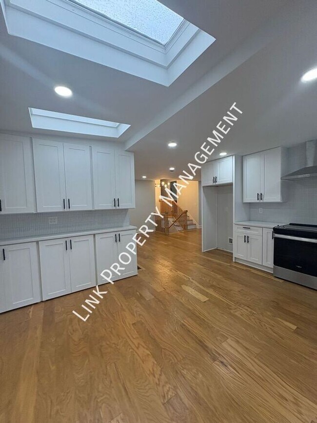 Building Photo - JUST REDUCE!  Sophisticated Tri-Level Home in Stuart Heights — Modern Comfort & Timeless Charming...