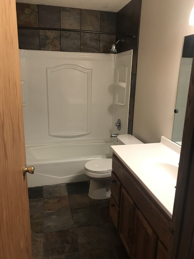 Bath with slate flooring and updated fixtures! - 8524 S Maplebrook Circle