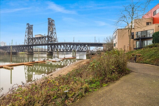 Building Photo - Newly Renovated condo with Stunning River ...