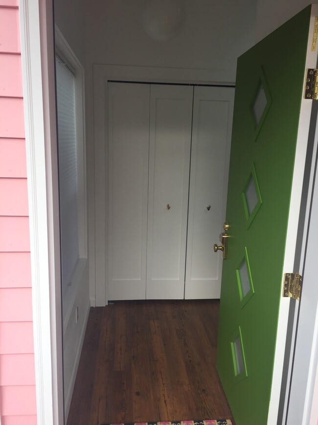 Front door opening to entry and utility closet - 3536 NE Rodney Ave