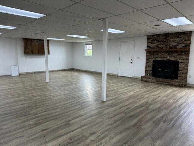 Building Photo - Situated in the heart of Sango, massive lot, and includes a fully finished & recently remodeled b...