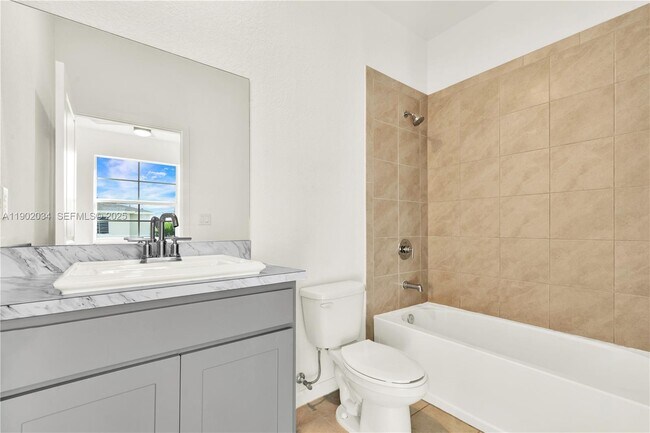 Building Photo - 496 NE 4th Terrace