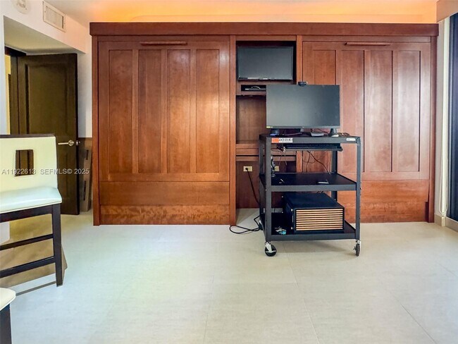 Building Photo - 8877 Collins Ave