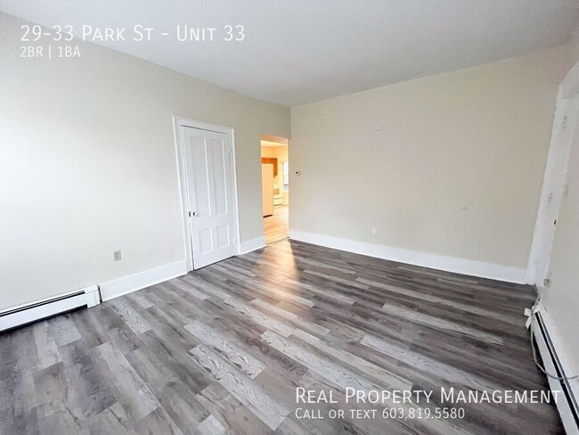 Building Photo - Pet-Friendly, Downtown 2-Bed with Heat and...